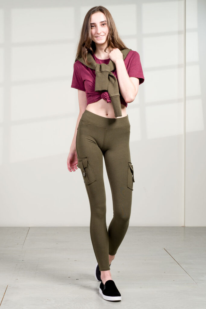Maroon colored top with olive green leggings with pockets