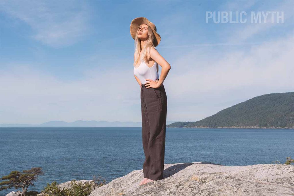 Women's dark brown linen pants with a white bamboo bodysuit outfit