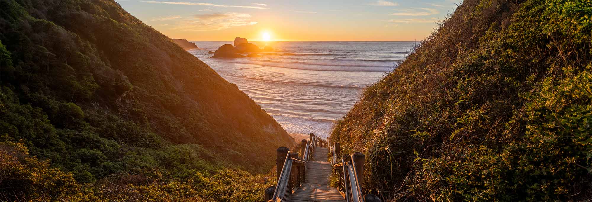Sunset view of Hiking trail to the beach in Big Sur, California